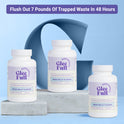 Product display for GleeFull Meno Belly Flusher dietary supplement. A purple banner across the top reads: 'Flush Out 7 Pounds Of Trapped Waste In 48 Hours'. Three white bottles with purple and cream labels are arranged on grey marble blocks against a blue background with a large blue letter G graphic. Each label reads 'GleeFull Supplements, Maintains Bloat Free Midsection, Meno Belly Flusher, Dietary Supplement, 60 Capsules'.