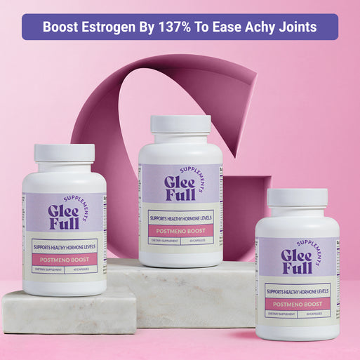 Three white GleeFull PostMeno Boost bottles on marble blocks against a pink background. Purple banner reads: 'Boost Estrogen By 137% To Ease Achy Joints'. Labels read 'Supports Healthy Hormone Levels, PostMeno Boost, 60 Capsules'.